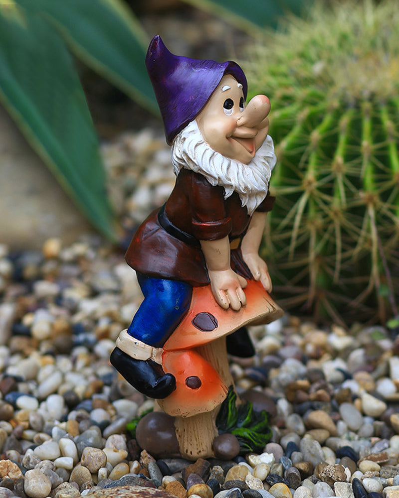 Joyful Gnome Sitting on a Mushroom Garden Statue